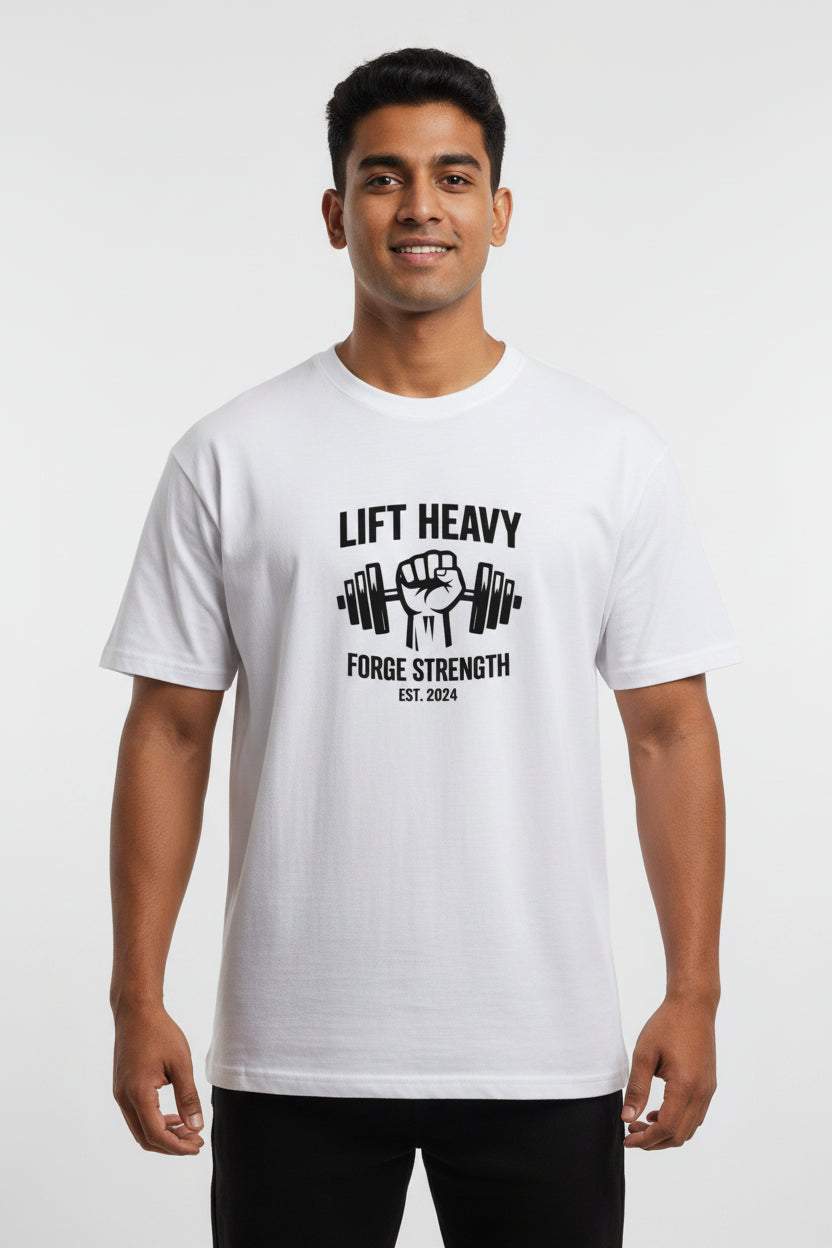 White t-shirt with 'Lift Heavy Forge Strength' graphic on a white background
